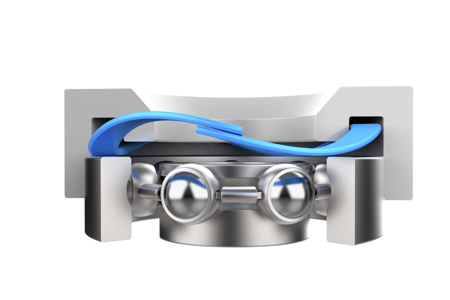 Single-turn wave spring maintaining bearing preload in a compact assembly.