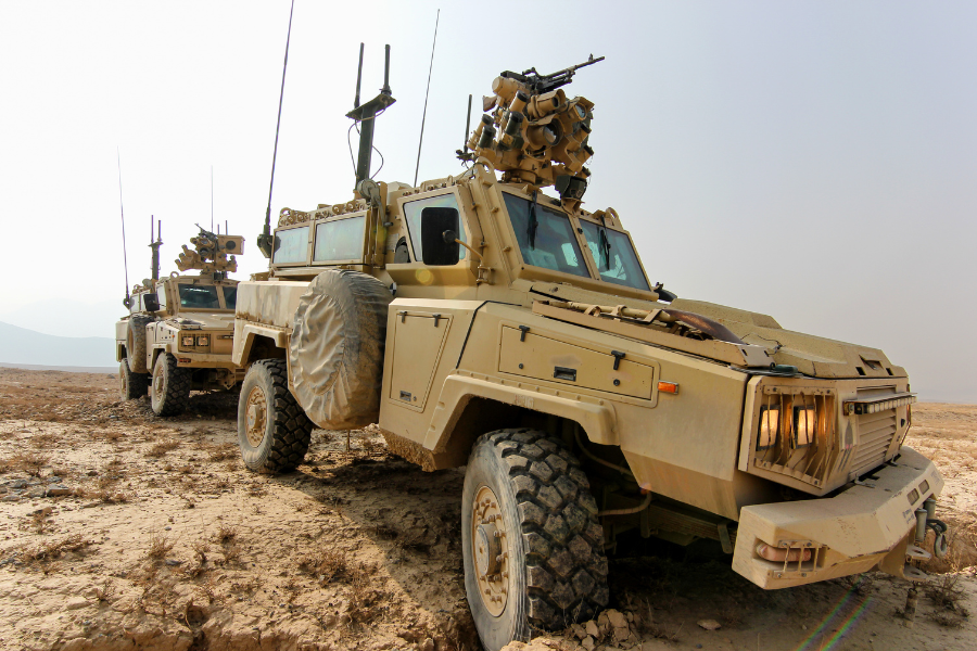 Armored military ground vehicles using retaining rings and wave springs across mechanical and driveline assemblies