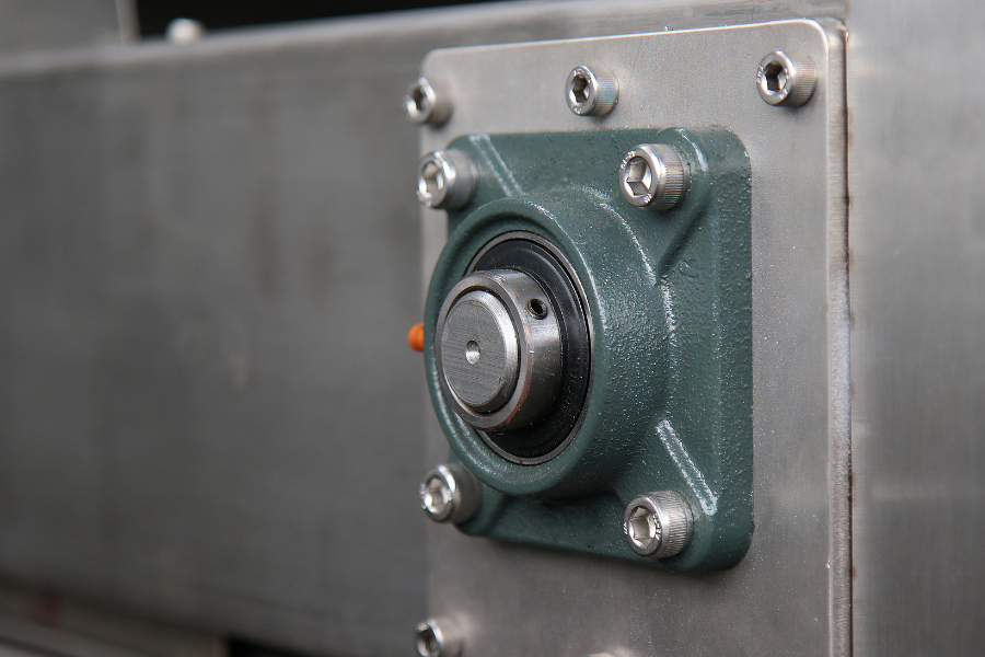 Mounted industrial bearing housing on machinery