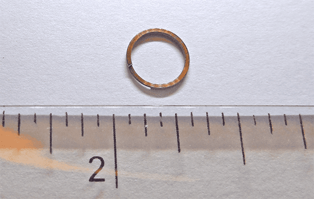 tiny spiral ring on ruler
