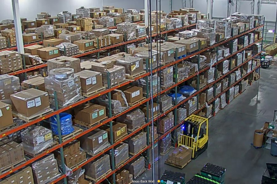 texas warehouse with stocked shelves and forklift